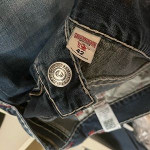 Mens jeans. Used. True Religion size 42. Blue w/ red stitching. Rare combination